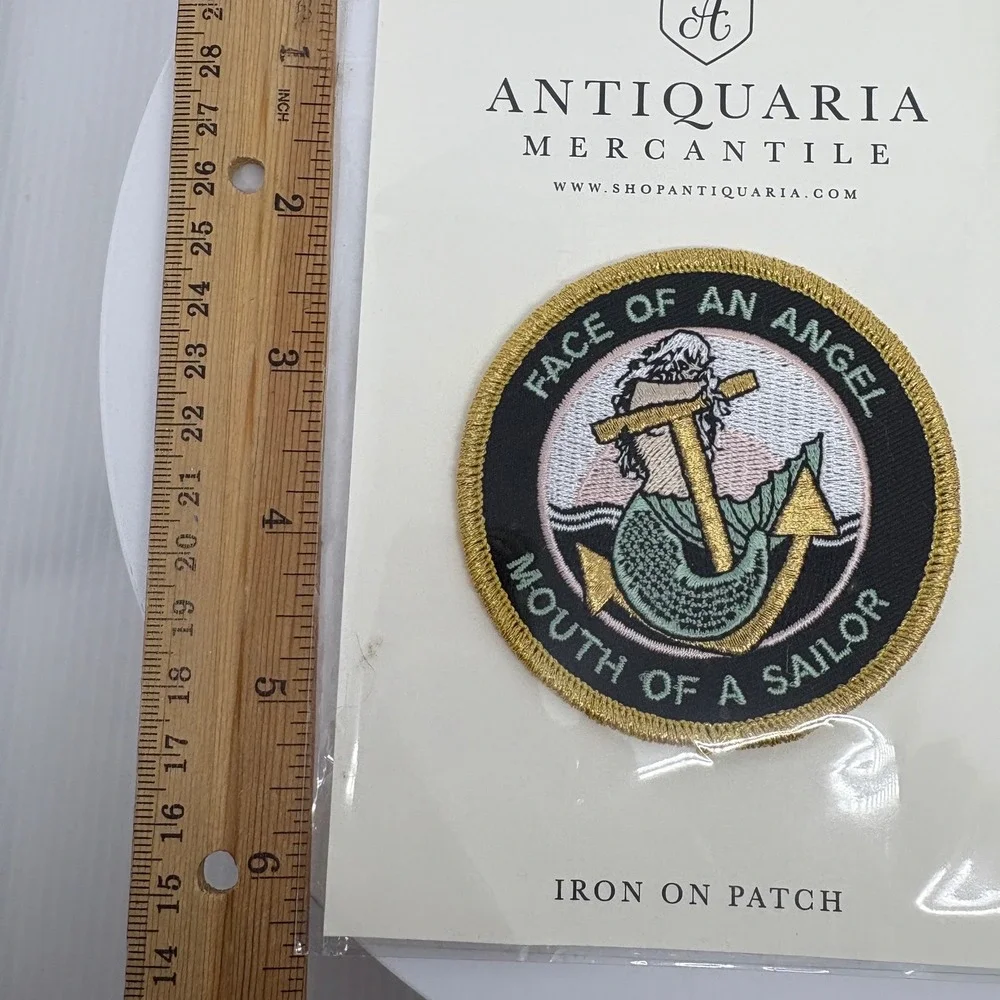 Antiquaria Mercantile Face of an Angel Mouth of a Sailor Mermaid Iron On‎ Patch